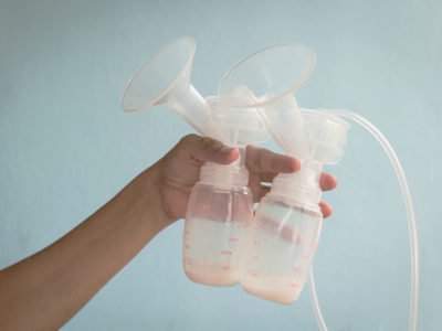 Mom hold Breast Pump