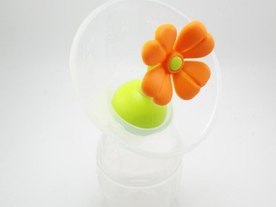 Haakaa silicone breast pump with flower stopper store in fridge